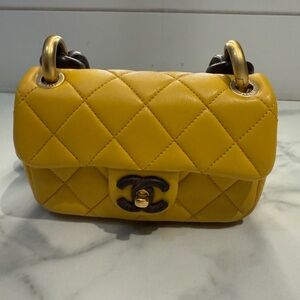 CHANEL Mustard Quilted Mini Bag
